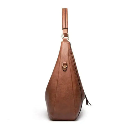 Sienna - Elegante Borsa a Spalla con Frange e Intagli