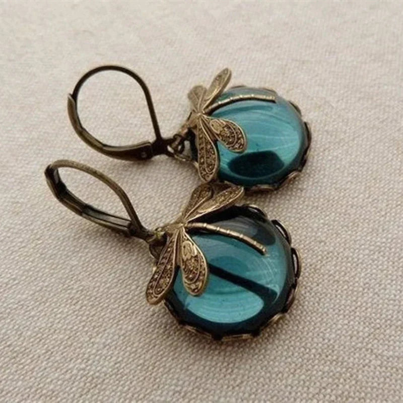 Avery - Orecchini in Pietra Luna a Forma di Libellula in Bronzo alla Moda
