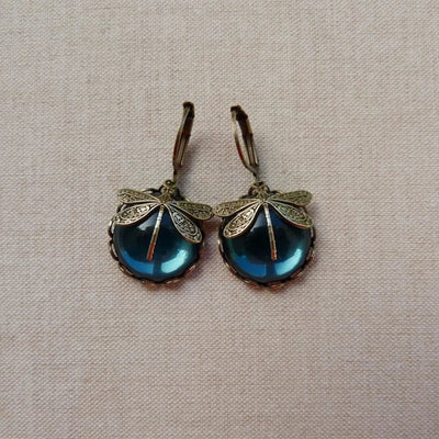 Avery - Orecchini in Pietra Luna a Forma di Libellula in Bronzo alla Moda