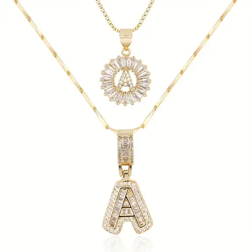 Set collana con iniziale incastonata | Oro